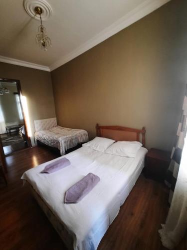Ein Bett oder Betten in einem Zimmer der Unterkunft Kobuleti Deluxe Apartments with Sea View