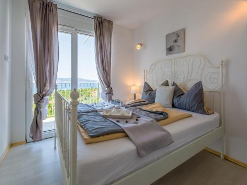 Postel nebo postele na pokoji v ubytování Apartments LAVARIN