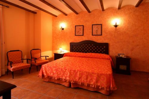 Säng eller sängar i ett rum på Hotel Rural Llano Piña