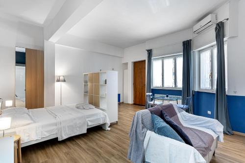 A bed or beds in a room at True Blue Casa Vacanze