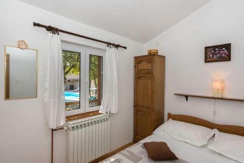 Giường trong phòng chung tại Villa Marina