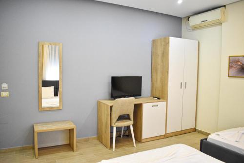 TV a/nebo společenská místnost v ubytování HotelApart - DelMar