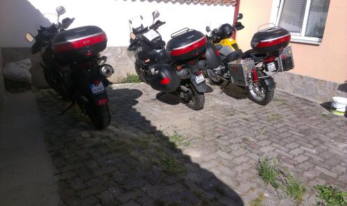 a group of motorcycles parked next to a building at City Center Apartments Ohrid in Ohrid