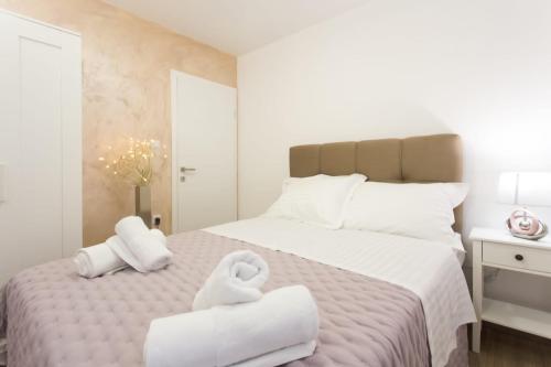 Łóżko lub łóżka w pokoju w obiekcie Split apartment