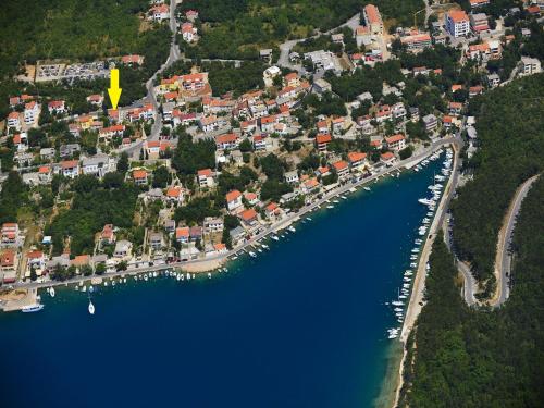 an aerial view of a harbor with boats in the water at Apartments Barbara 2 in Jadranovo
