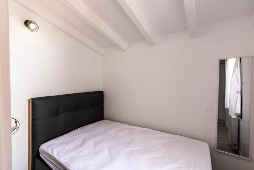 Posteľ alebo postele v izbe v ubytovaní Le Paesolu