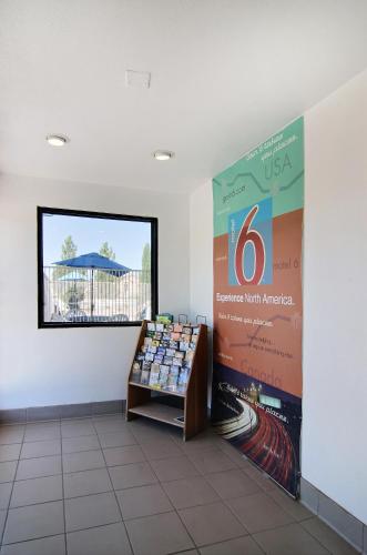 a store with a large sign on the wall at Motel 6-Carlsbad, NM in Carlsbad