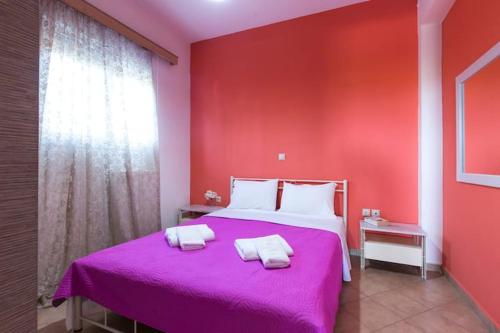 Ένα ή περισσότερα κρεβάτια σε δωμάτιο στο Nikis Apartments Kisamos