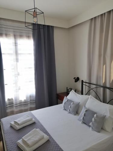 Letto o letti in una camera di OASIS APARTMENTS