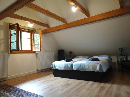 Postel nebo postele na pokoji v ubytování Ferienhaus Blommers