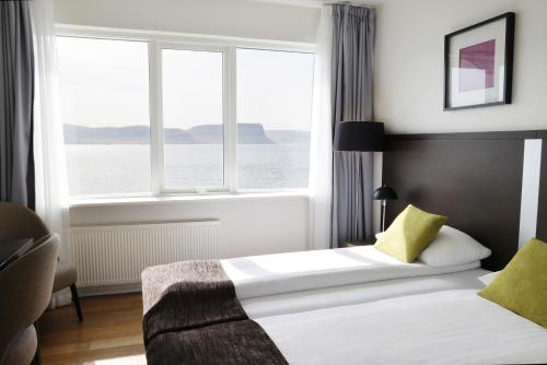 Llit o llits en una habitació de Fosshotel Westfjords