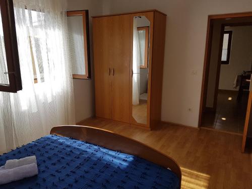 Posteľ alebo postele v izbe v ubytovaní Apartment Lavcevic