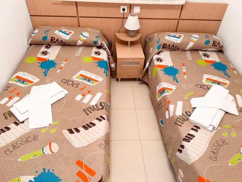 Postel nebo postele na pokoji v ubytování Apartamentos Boutique Calablanca