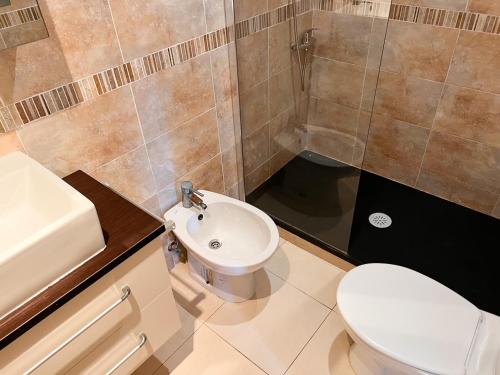 Koupelna v ubytování Apartamentos Boutique Calablanca