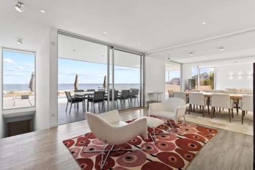 a living room with a view of the ocean at Casa do Azimute by Real Vision in Porto Santo
