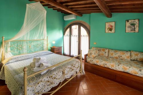 Posteľ alebo postele v izbe v ubytovaní Casa al Monte by VacaVilla