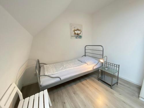 Postel nebo postele na pokoji v ubytování Dorpsweg 18 nummer 4