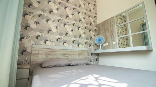 Postel nebo postele na pokoji v ubytování Villa Safari Syariah with Mountain View