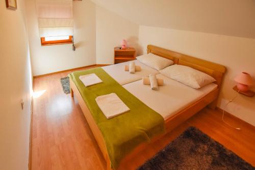 Posteľ alebo postele v izbe v ubytovaní Apartments Kalista