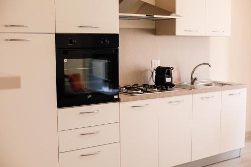 Η κουζίνα ή μικρή κουζίνα στο Sofíta - Rooms & Apartment