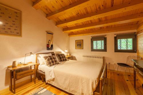 Posteľ alebo postele v izbe v ubytovaní Masia Spa Can Pascol Casa Ecologica