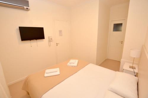 Postel nebo postele na pokoji v ubytování Hotel Acqua