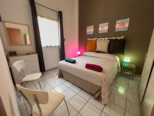 A bed or beds in a room at Monolocale Salento