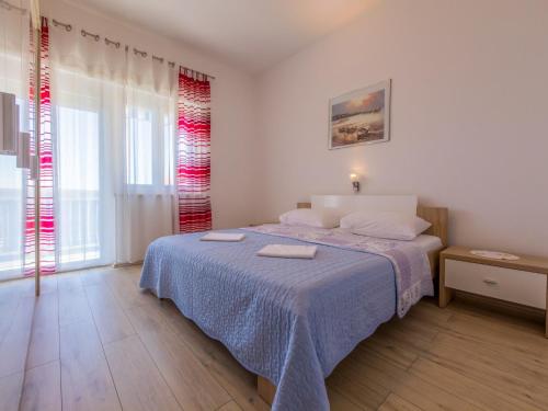 Posteľ alebo postele v izbe v ubytovaní House Blanka