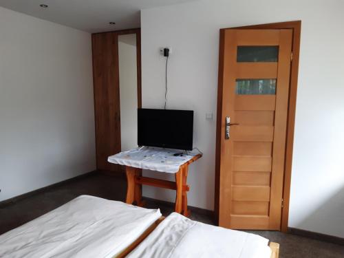 Et tv og/eller underholdning på Pokoje Gościnne u Moni