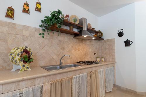 Een keuken of kitchenette bij Appartamento Limone