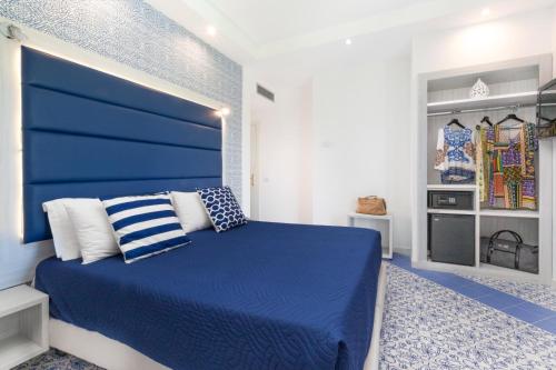 Tempat tidur dalam kamar di Hotel Sant'Agata