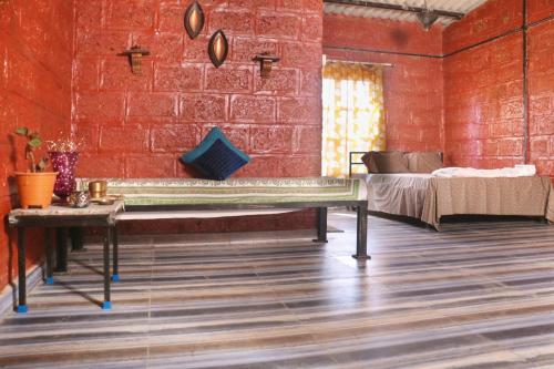 Postel nebo postele na pokoji v ubytování SiddhaDham - Farm Stay & Wellness Retreat