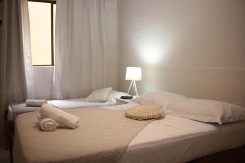 Una cama o camas en una habitación de Pousada Barbroch