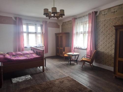 Postel nebo postele na pokoji v ubytování Apartmán Měňany