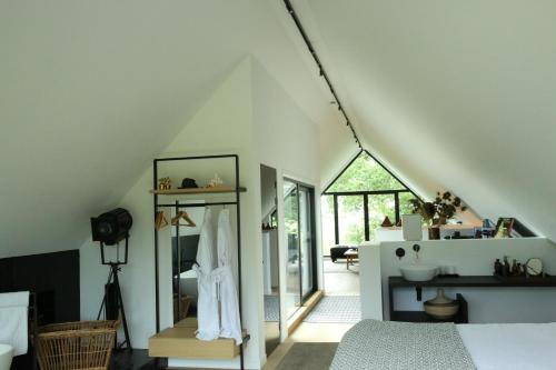 Postel nebo postele na pokoji v ubytování Rozeboom Loft