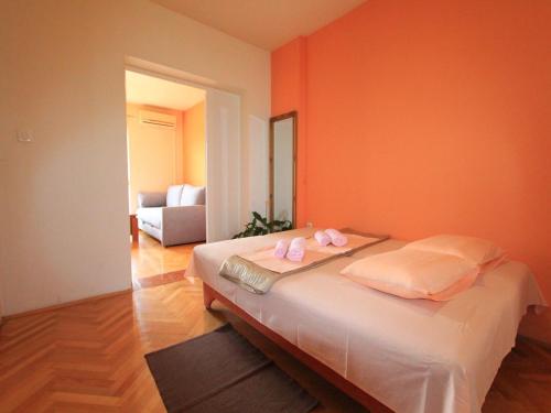 Кровать или кровати в номере Apartment Tamarut