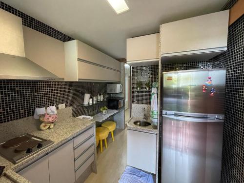 Køkken eller tekøkken på Winterville Gravata Flat Lindo