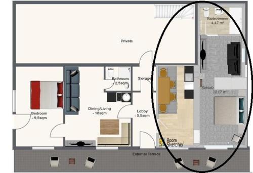 a floor plan of a house with a circle at Apartment Haus Starfach in Döbriach