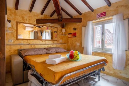 Postel nebo postele na pokoji v ubytování ROMA VATICAN HOUSE GOLD LOFT