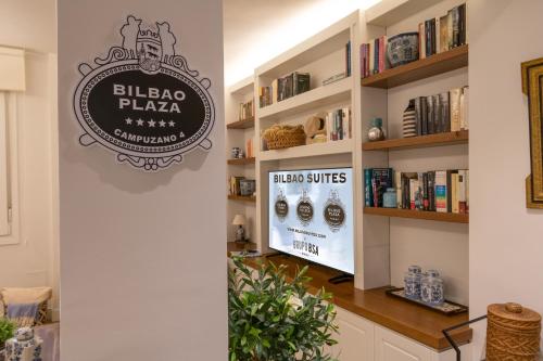 ビルバオにあるBilbao Plaza Campuzano de Bilbao Suites, elegante y céntricoのピザアマアマアマアマアマアマアマアマアマアマアマアマアマアマアマアマアマの標識