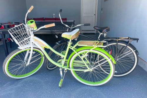 two bikes are parked next to each other at Beach Shuttle and Pool Bishops Landing Townhome in Millville