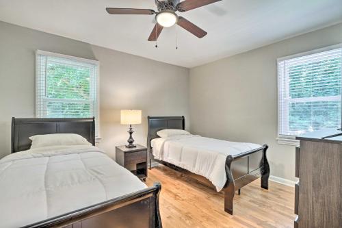 A bed or beds in a room at Family-Friendly ATL Escape about 3 Mi to Dtwn!