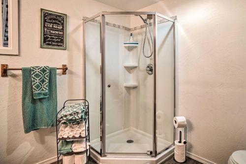 a shower with a glass enclosure in a bathroom at Outdoor Adventure Tranquil Creekside Retreat in Merlin
