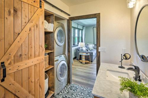 a bathroom with a washer and dryer in a house at Charming Lodi Retreat Walk to Local Wineries in Lodi