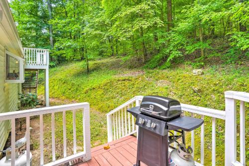 a grill on a porch of a house at Secluded Chattanooga Getaway with Deck and Yard! in Chattanooga