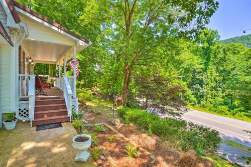 an image of a house with a porch and trees at Secluded Chattanooga Getaway with Deck and Yard! in Chattanooga