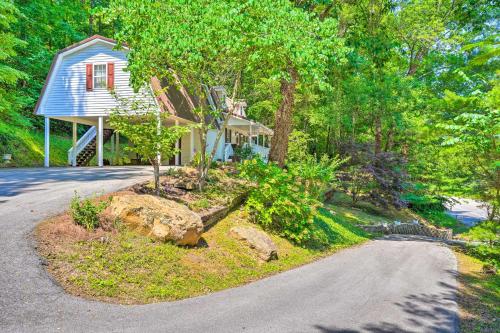 a house with a road in front of it at Secluded Chattanooga Getaway with Deck and Yard! in Chattanooga