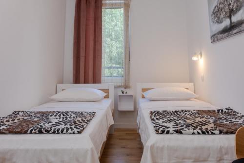 Posteľ alebo postele v izbe v ubytovaní Super modern Apartment Gold, Beautiful View