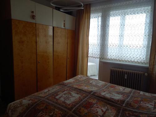 Postel nebo postele na pokoji v ubytování Byt s výhľadom na Vysoké Tatry