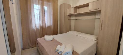 Postel nebo postele na pokoji v ubytování Liberato Puglia Vacanze